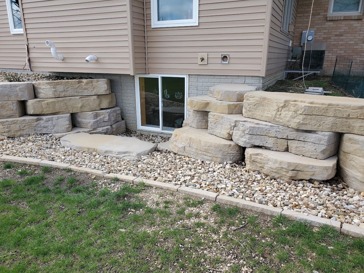 low level retaining wall on basement level of home